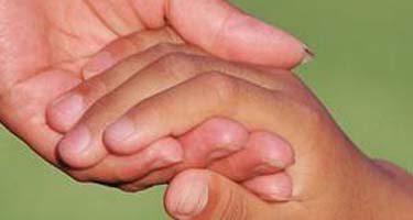 litttleoneholdinghands.jpg